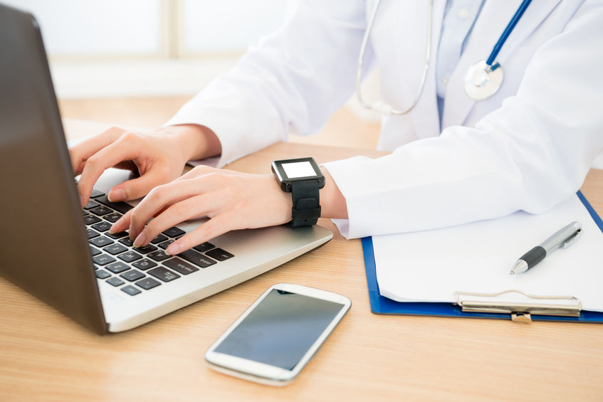 doctor wearing smartwatch with blank screen